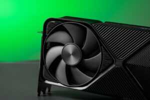 A close up of a computer fan on a table